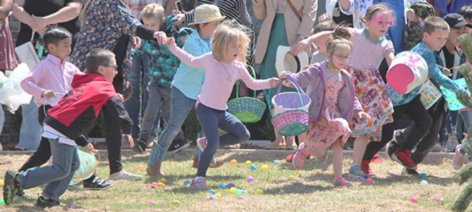It’s a mad dash for the eggs, as ages five through seven take off during the April 17 “Surrey Hills Community Egg Hunt,” held at Grace Communion Surrey Hills Church. Photo / Carol Mowdy Bond