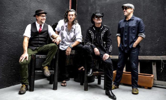 Pictured above are the members of Roger Clyne &amp; The Peacemakers. Photo / Provided